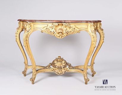 null Moulded, carved and gilded wooden console, the belt is decorated with a shell...