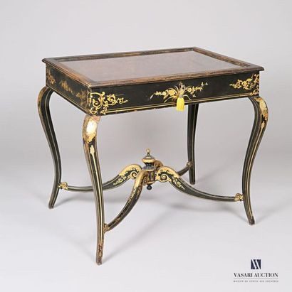 null Table showcase in moulded natural wood and black lacquered with gold decorations...