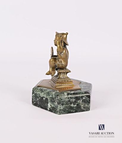 null Bronze subject featuring a sinuous figure sitting on a pedestal, sea-green marble...