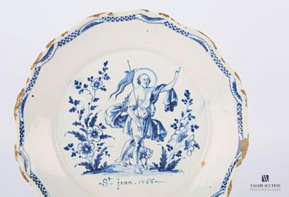 null Nevers 18th century 
Earthenware plate with contoured rim decorated in blue...