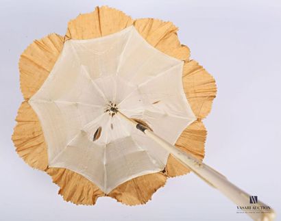 null Chantilly lace umbrella with flower decoration on a cream silk background, white...