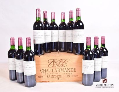 null 12 bouteilles	Château LARMANDE	St Emilion GCC	1997
	Et.: 11 impeccables, 1 un...