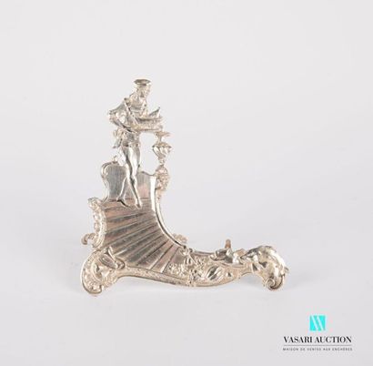 null Silver plated metal menu holder showing a servant descending the stairs with...