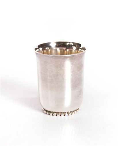null Small silver plated metal kettledrum, resting on a frame, with a flared neck,...