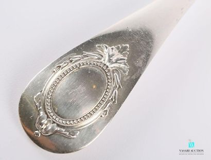 null Two silver-plated metal ladles, the handle decorated with a blind medallion...