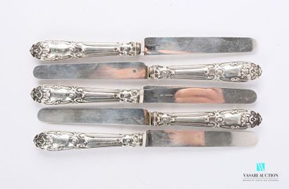 null Set of five silver fruit knives, the handle filled with rinceaux and cartouches...
