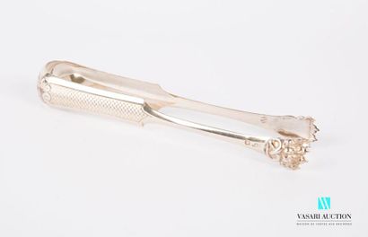 null Silver sugar tongs, the arms adorned with a reserve decorated with guilloché...