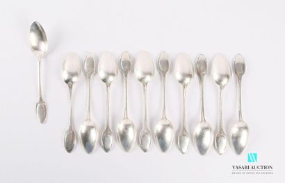 null A suite of eleven silver teaspoons, the handle decorated with fillets and finished...