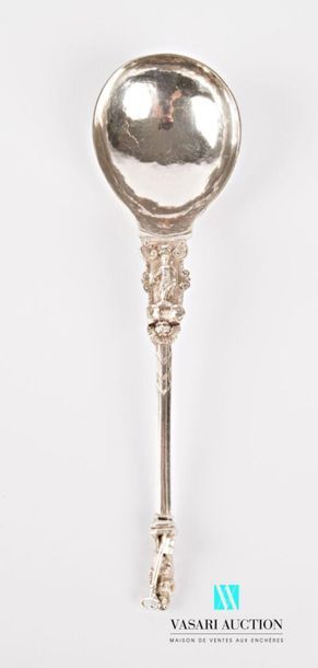 null Silver serving spoon, the handle has a bacchus resting on a mound supported...