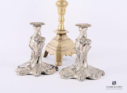 null Pair of silver plated ruler end tables set on a scrolled base decorated with...