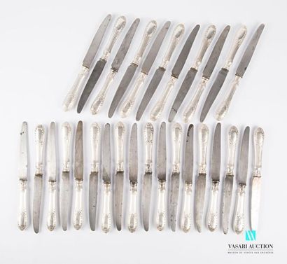null Suite of twenty-nine table knives, the handles in filled silver decorated with...