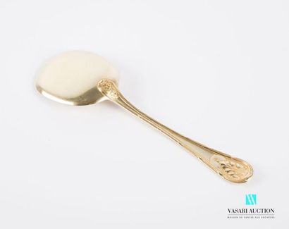 null Ice-cream serving spoon in gold-plated silver, the handle decorated with fillets...