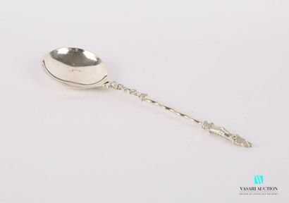 null Spoon in silver, the moving handle is surmounted by foliage and finished by...