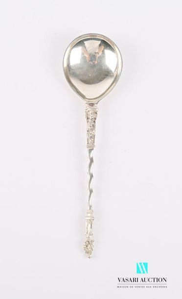 null Spoon in silver, the moving handle is surmounted by foliage and finished by...