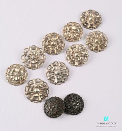 null Set of nine silver plated metal buttons in the shape of an openwork rosette...