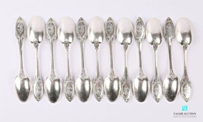 null A suite of twelve silver teaspoons, the handle finished in an ogive with waves,...