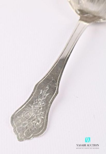 null Cream spoon in silver, the moving handle with engraved flower decoration, the...