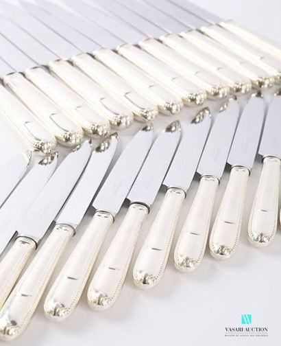 null Set of twelve table knives and twelve dessert knives, the handle in silver with...