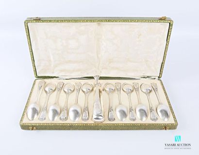 null A suite of twelve teaspoons and a silver sugar tongs, the handle decorated with...