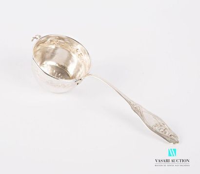 null Silver tea strainer 800 thousandths, the handle and the border decorated with...