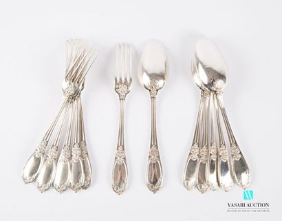 null A suite of six silver cutlery sets, the fluted handles are finished with a blind...