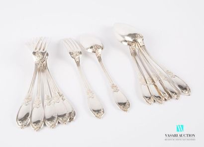 null A suite of six silver cutlery sets, the fluted handles are finished with a blind...