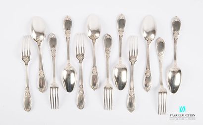 null A suite of six silver cutlery sets, the fluted handles are finished with a blind...