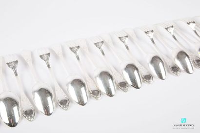 null A suite of twelve silver-plated metal cutlery sets, the handle decorated with...