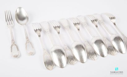 null A suite of five pieces of cutlery and a silver-plated metal table fork, the...