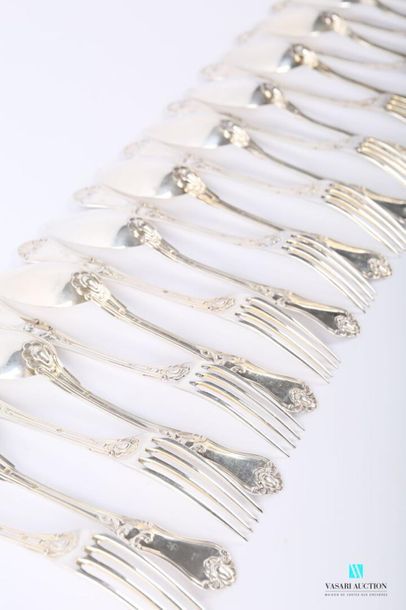 null A suite of twelve silver cutlery with a silver plated centrepiece, the moving...