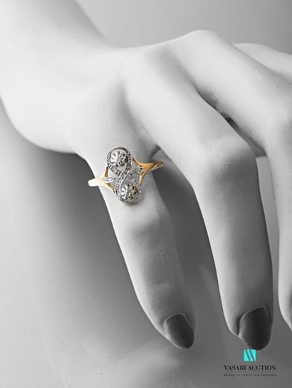 null Ring in 750 thousandths yellow gold, motif in eight set with old cut diamonds...