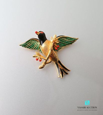 null CARVEN
Broche figurant un oiseau branché en métal doré et émaux polychrome
(usures...