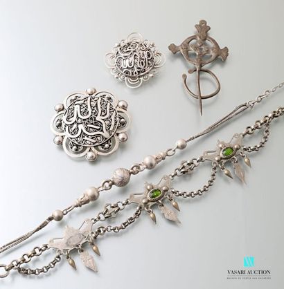 null Silver lot including two calligraphic motif brooches in its center decorated...
