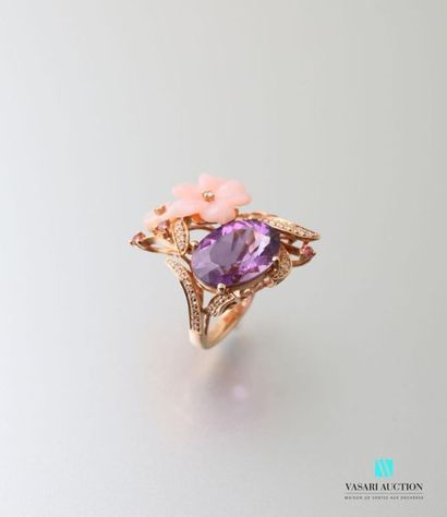 null 
750 thousandths rose gold ring set with an oval facetted violet stone, three...