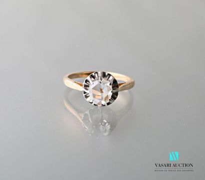 null Ring in yellow gold 750 thousandths adorned with a rose cut diamond in a scalloped...