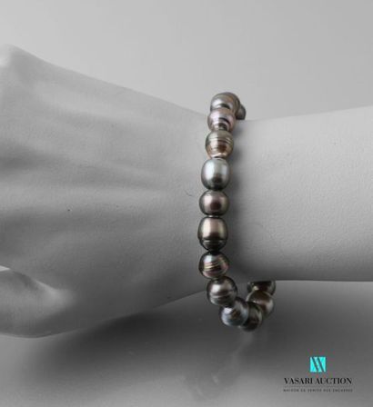 null Bracelet on elastic cord decorated with Tahitian pearls 