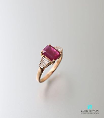 null 750 thousandths pink gold ring set with a 1.74 carat emerald-cut ruby at its...