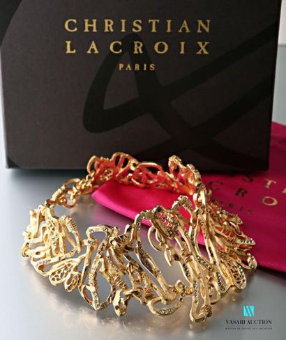 null CHRISTIAN LACROIX
Necklace in openwork gilded metal composed of five rigid elements,...