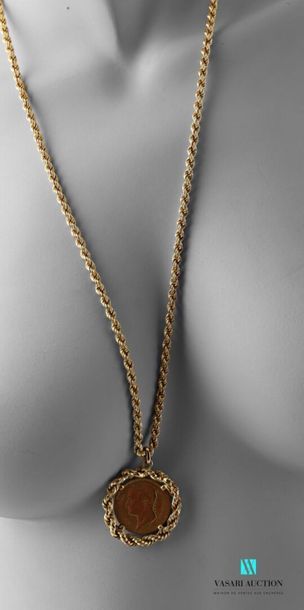 null A necklace and a pendant in 750 thousandths yellow gold, twisted mesh, the pendant...