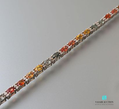 null Line bracelet in silver set with multicoloured sapphires, clasp snap hook
Gross...