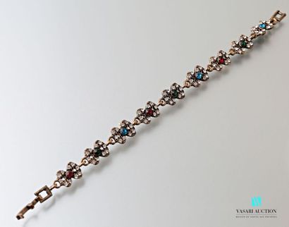 null Metal bracelet decorated with butterfly motifs embellished with fancy stones.
Length:...