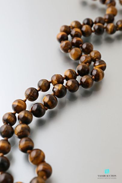 null Necklace decorated with tiger eye beads, metal clasp
Length: 58 cm 