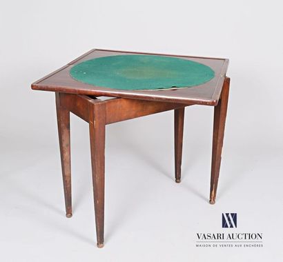  Mahogany veneer games table, the rectangular top swivels and unfolds, revealing...