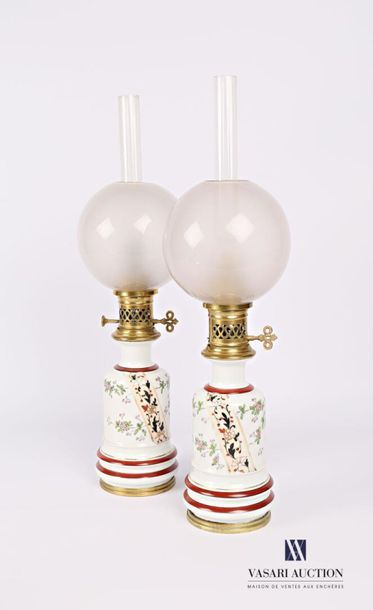 null Pair of white porcelain oil lamp with polychrome decoration of flowering branches...