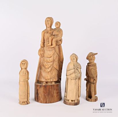 Set of four carved wooden subjects, one representing...