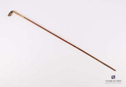 null Cane in natural wood, the pommel in horn carved with a horse's foot and hoof,...