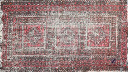null Wool carpet decorated with three rhombuses inscribed in squares hemmed with...