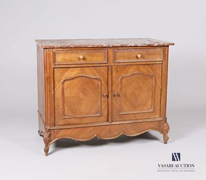 null Moulded natural wood sideboard, it opens on the front with two drawers in the...