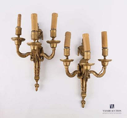 null Pair of bronze sconces with three light arms, the shaft decorated with garlands...