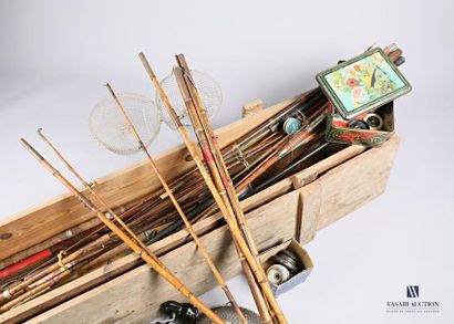 null Wooden box containing fishing equipment including bamboo rods, hooks, floats,...